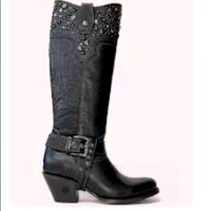 Black star all leather boots.